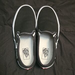 Vans Womens Black and White Slip-On Sneakers